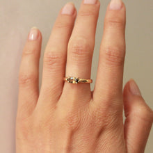 Load image into Gallery viewer, Women&#39;s sapphire vow ring set in 14k gold on finger. this is how talayee does jewelry
