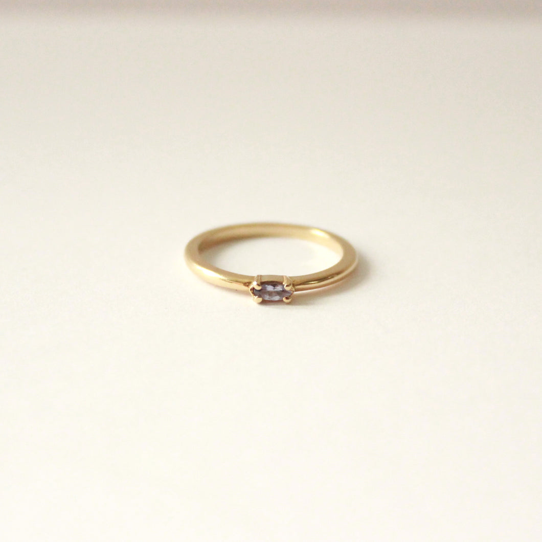 14k yellow gold tanzanite ring. Perfect for pairing with other stacking rings