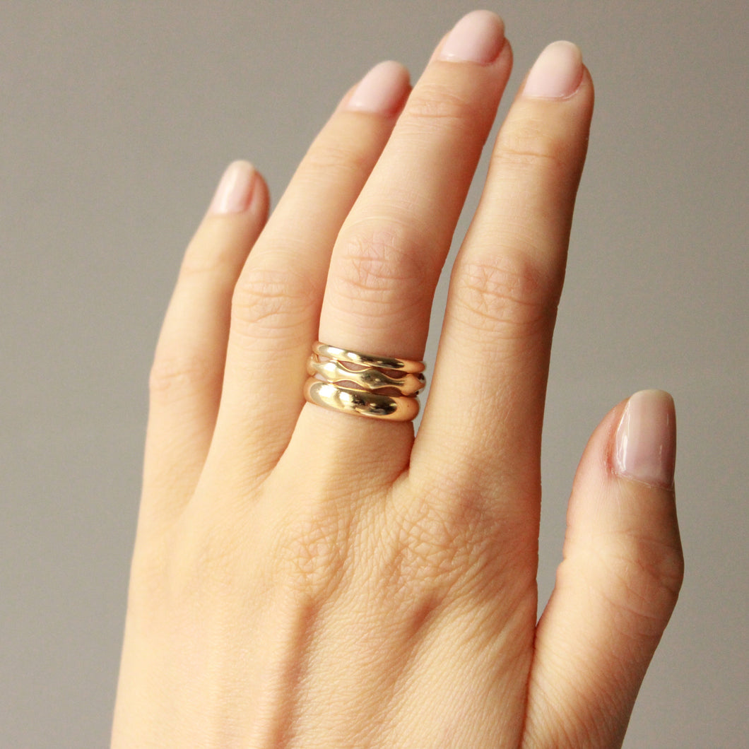 short and sweet ring vows. 14k solid gold stacking rings on figure.