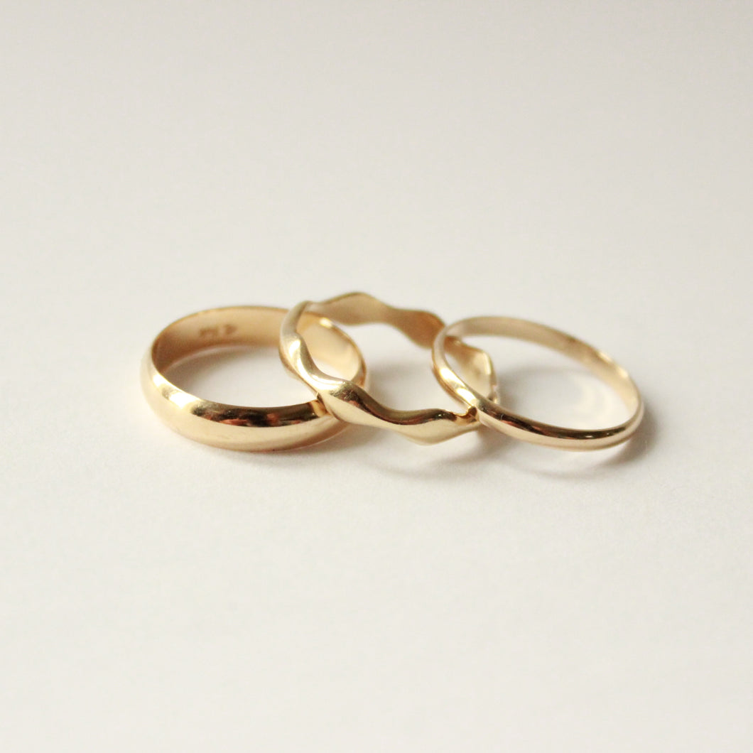 14k gold stackable rings on white background. wedding ring vows. best online jewelry stores reddit